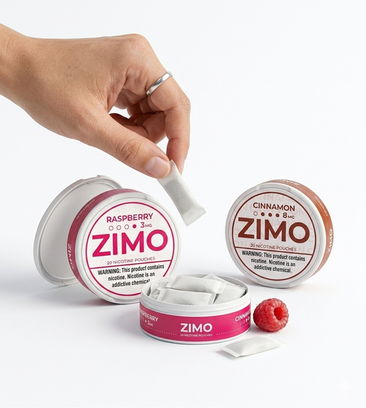 ZIMO nicotine pouches with a hand picking up one, on a white background